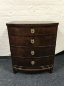A mahogany four drawer bowfronted chest