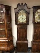 A 19th century mahogany longcase clock with classical painted dial by Roberts, height 221 cm.