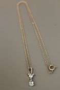 A 9ct white gold aquamarine pendant on chain