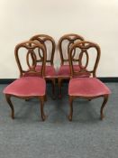 A set of four Victorian style dining chairs upholstered in a pink dralon fabric