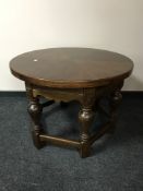 An early 20th century oak coffee table,