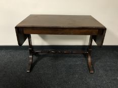 A drop leaf sofa table
