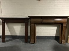 An antique mahogany fire surround and one other