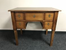 A continental mahogany lady's desk fitted five drawers