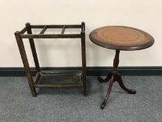 An oak stick stand with lift out tray together with a mahogany leather topped wine table
