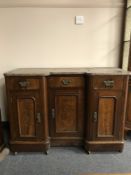 A late Victorian marble topped inverted break fronted washstand, width 121 cm.