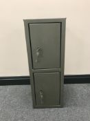 A metal hand gun safe with keys