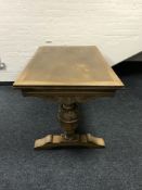 A carved oak refectory dining table