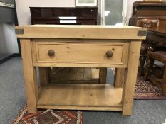 A reclaimed pine butcher's block fitted with a drawer