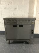 A commercial stainless steel double door warming cabinet