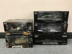 Five boxed Unimax Forces of Valor die cast military vehicles including US M-H60G pave hawk,
