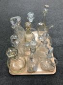 A tray of assorted glass decanters