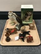 A tray of Royal Doulton and Beswick whiskey decanters, including a boxed short eared owl, barn owl,