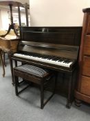 A 20th century oak cased mini piano by Dale Forty of London and storage piano stool