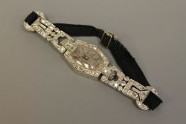 Superb quality Lady's platinum cocktail watch set with approximately 2.