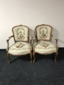 A pair of Continental carved walnut armchairs with tapestry seats (2)