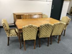 A 20th century inlaid mahogany continental dining room suite on cabriole legs comprising of