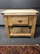 A reclaimed pine butcher's block fitted with a drawer