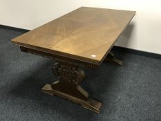 An oak refectory dining table