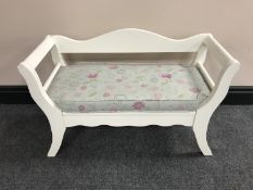 A miniature child's window seat