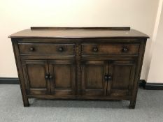 An Ercol double door sideboard