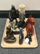 A tray containing a bronzed figure of a Buddha, a Spirit of the Plains Chuck Ren figure,
