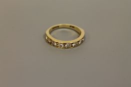 18ct nine stone half eternity ring approximately 1ct,