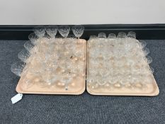 Two trays containing Lyngby crystal drinking glasses