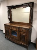 A late Victorian mirror backed mahogany sideboard