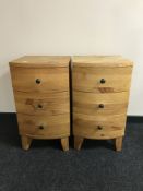 A pair of contemporary plantation pine bedside chests