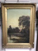 Nineteenth century school : cottage by a lake, oil on canvas, indistinctly signed, framed.