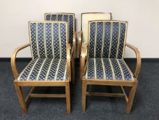 A set of four oak carver armchairs