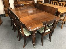 An early Victorian mahogany extending dining room table, width 117.