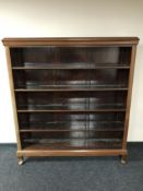 A large set of mahogany open shelves