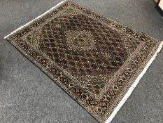 A Persian Tabriz carpet of millefiori design