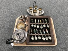 A tray of plated tea service, candlesticks, teaspoons,
