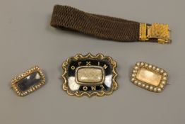A group of early 19th century memoriam jewellery including a hair bracelet with high carat gold