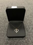 A boxed 9ct gold chain with pendant