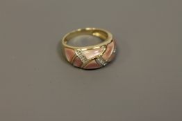 A 9ct gold ring set with diamonds