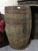A coopered oak whiskey barrel