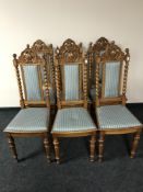 A set of six carved oak barley twist dining chairs