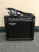 A Meridian Stage Pro guitar amp with lead,