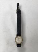 A lady's 9ct gold Longines watch on leather strap