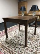 A contemporary oak effect extending table