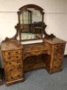 A good quality Victorian burr walnut dressing table, width 155 cm.