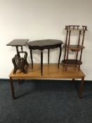 A late 20th century teak coffee table, an occasional table,