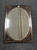 An early 20th century mahogany framed mirror