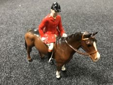 A Beswick figure - huntsman on a brown horse, model 1501,
