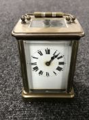 A French brass carriage clock with key