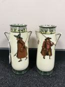A pair of Royal Doulton Isaac Walton ware twin handled vases